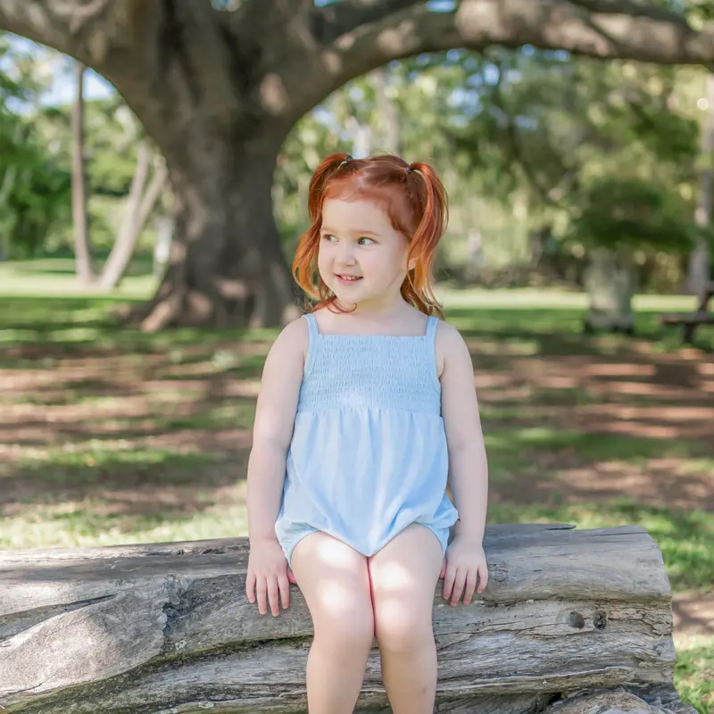 Smocked Bubble Romper In Breeze 1