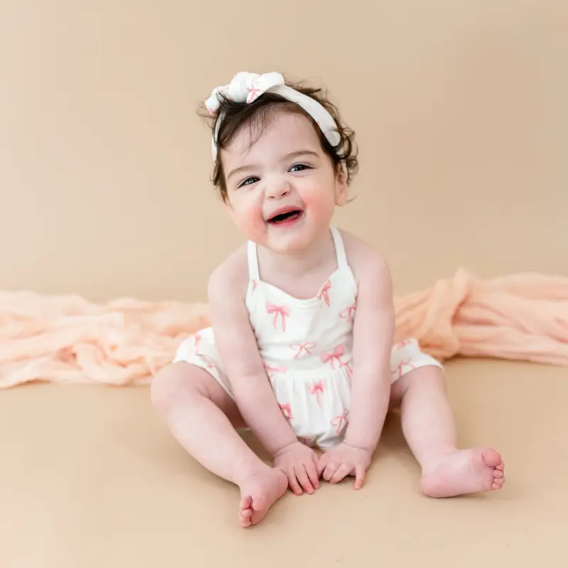 Spaghetti Strap Ruffle Romper In Bow 1