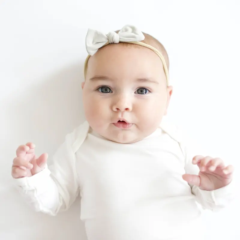 Tiny Nylon Bow In Oat 1