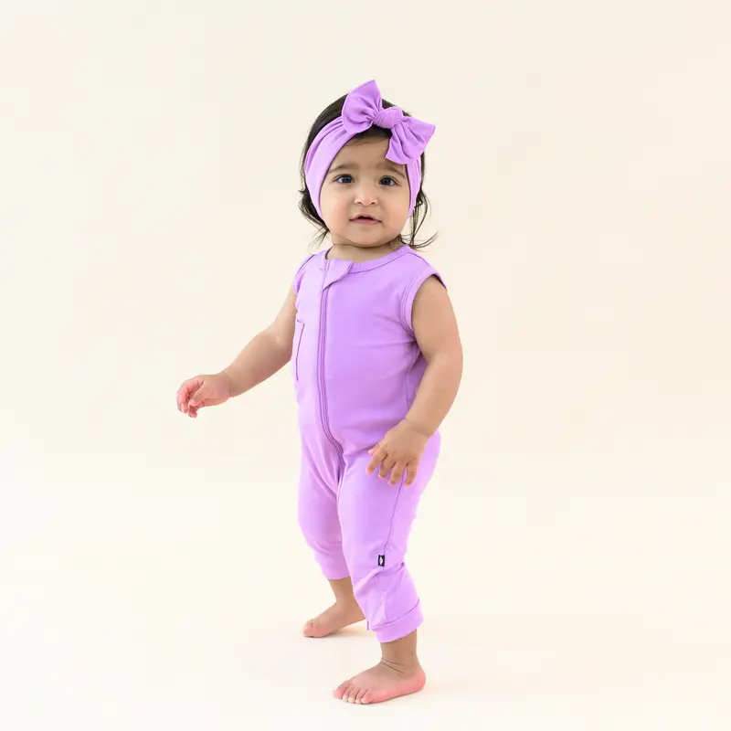 Zippered Sleeveless Romper In Poi 4