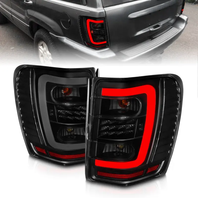 Anzo Led Tail Light Assembly For 1999–2004 Jeep Grand Cherokee – Black Housing, Smoked Lens, Integrated Light Bar 1